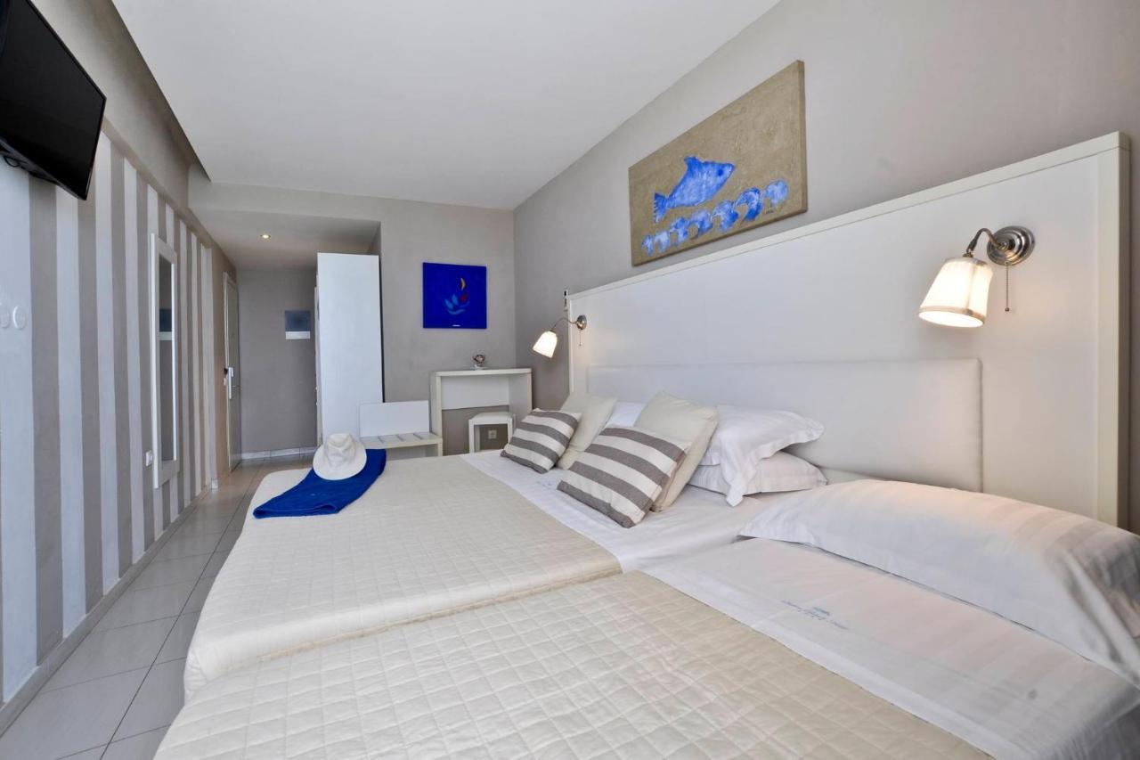 Dreibettzimmer mit direktem Meerblick