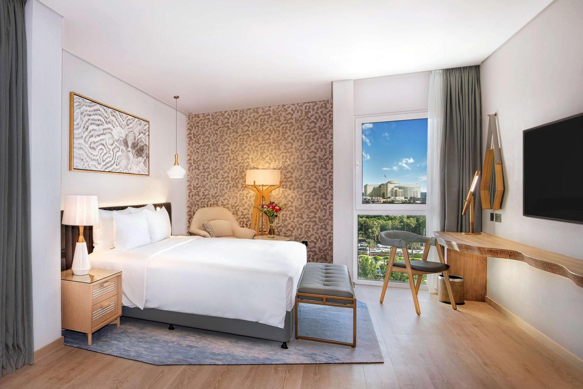 Premium Suite mit Meerblick und Zugang zur Lounge – inklusive kostenlosem Zugang zum Surf Pool, zum Abenteuerpark, zum Wellenbad und zum Strömungskanal
