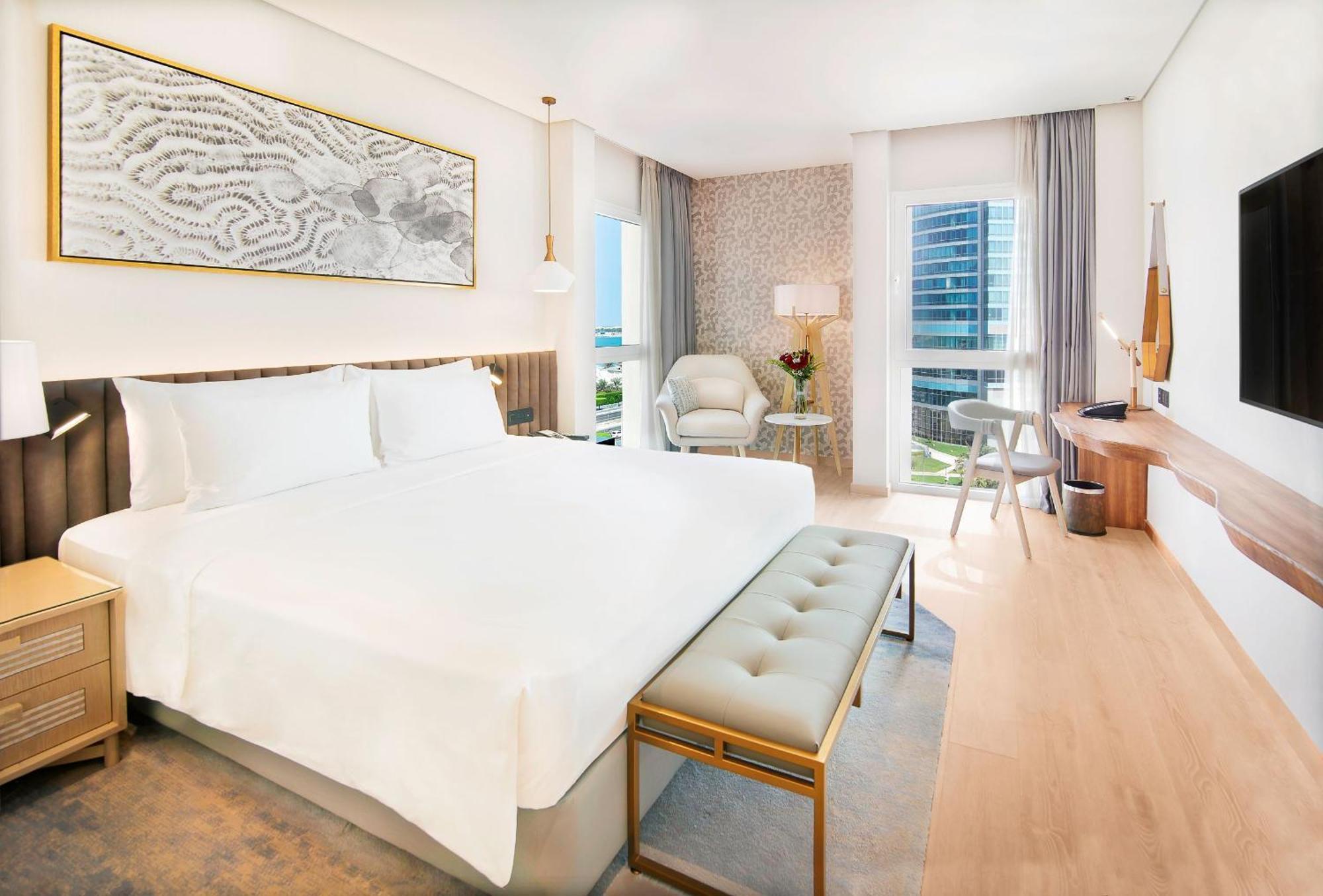 Premium Zimmer mit Meerblick – inklusive kostenlosem Zugang zum Surf Pool, zum Abenteuerpark, zum Wellenbad und zum Strömungskanal