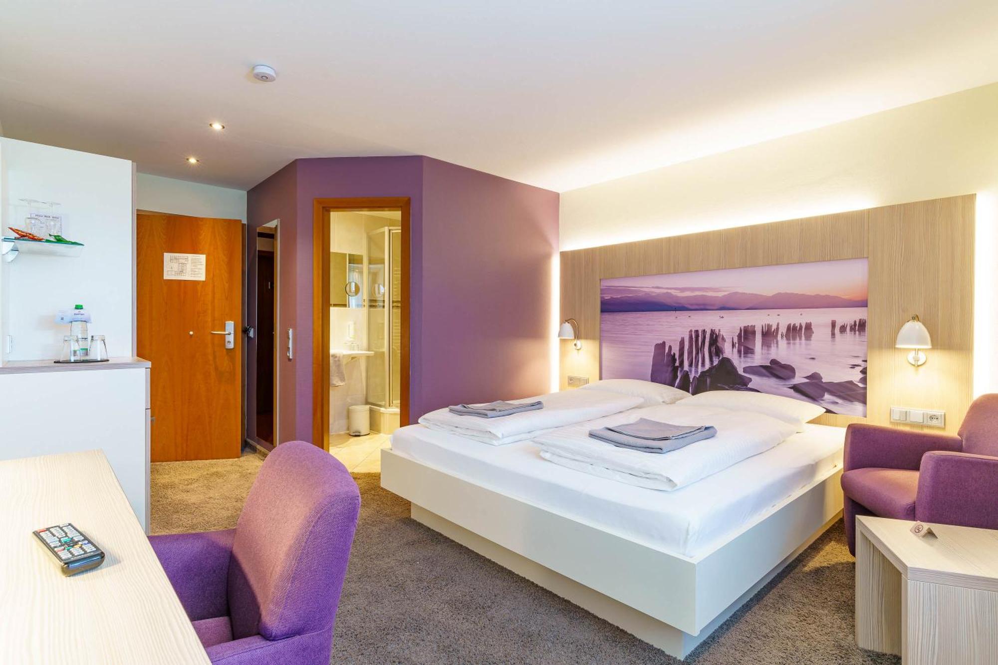 Comfort Zimmer mit Queensize-Bett und Balkon