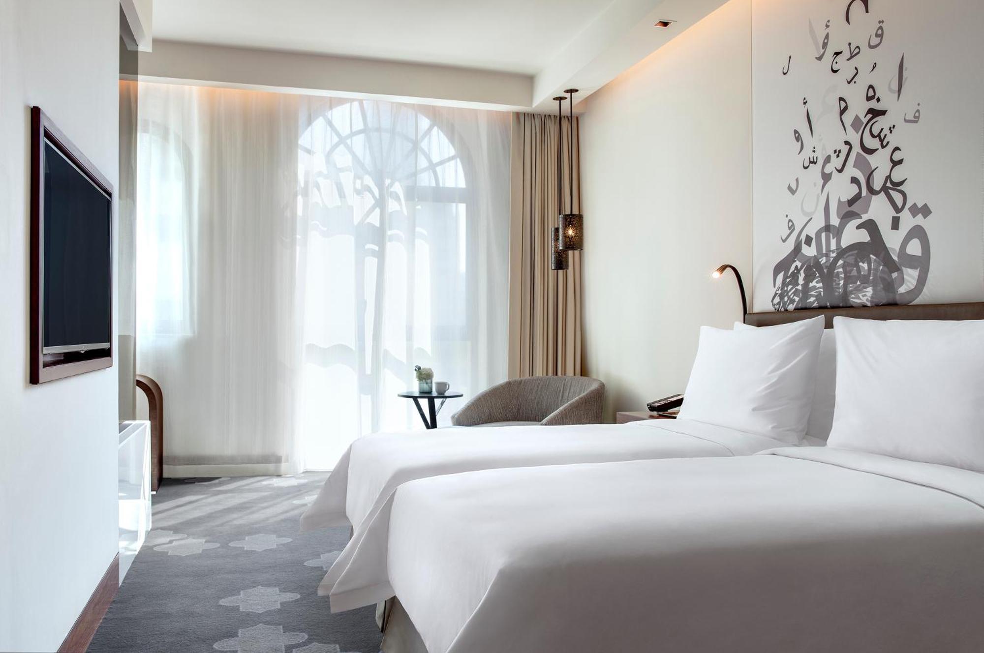 Deluxe Zweibettzimmer mit Poolblick