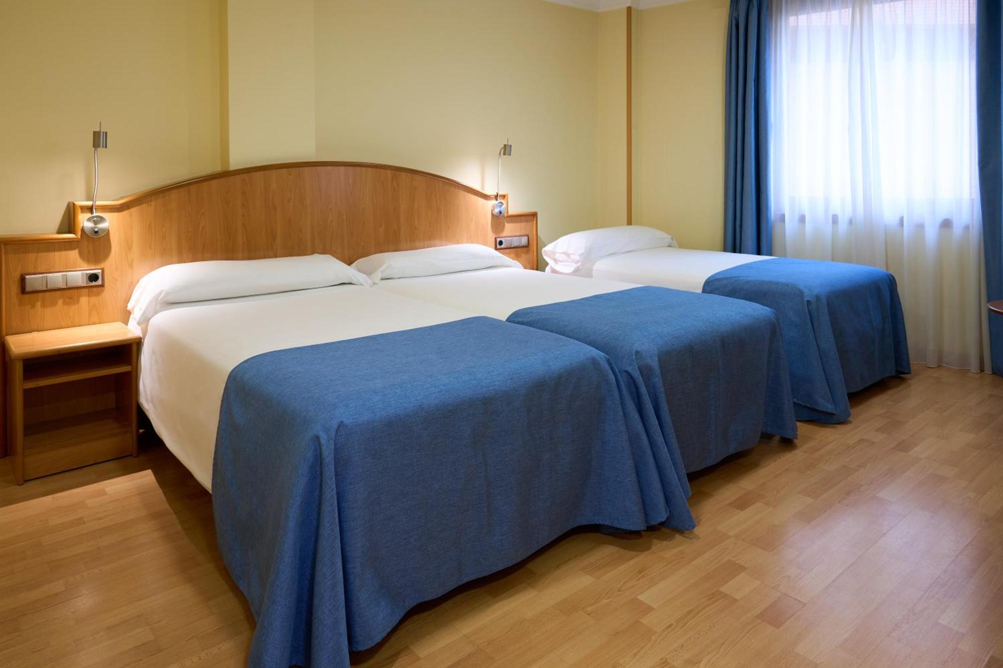 Dreibettzimmer