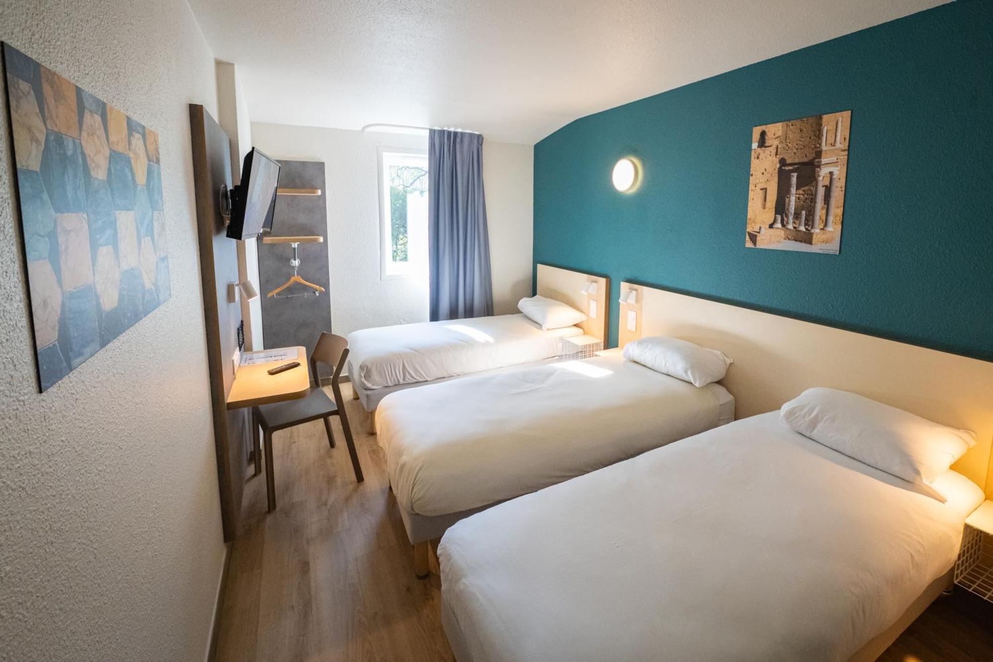 Dreibettzimmer mit 3 Einzelbetten