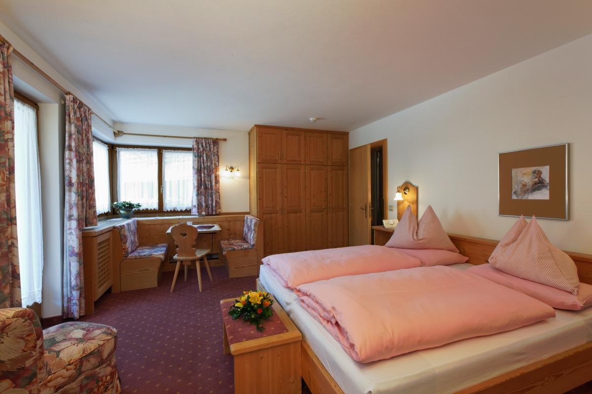 Dreibettzimmer mit Balkon