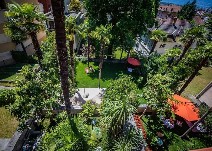 Hotel nahe College: Villa Muralto Boutique Hotel Rooms And Garden