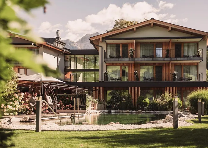 Wellness und Brunch Hotel MorgenZeit beheizter Naturteich Genuss Frühstück bis 13 Uhr Hochkönig Sommercard