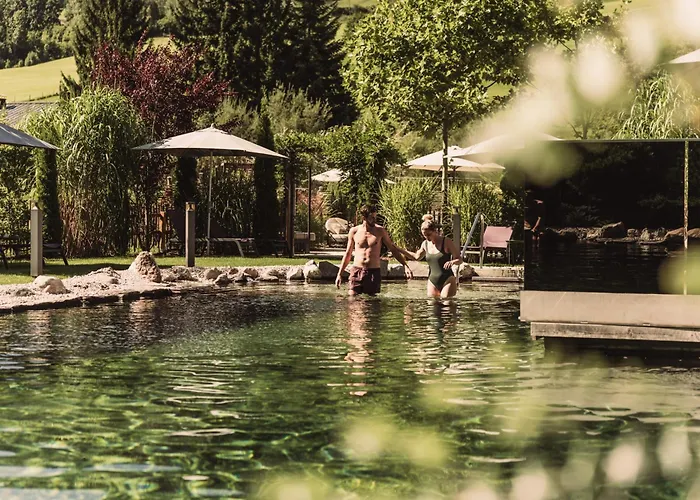 Wellness und Brunch Hotel MorgenZeit beheizter Naturteich Genuss Frühstück bis 13 Uhr Hochkönig Sommercard
